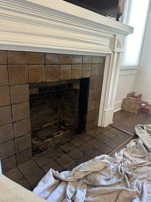 The old tile on the fireplace.