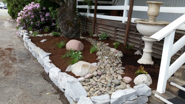 We sell wall rock, river rock, boulders and bark mulch.