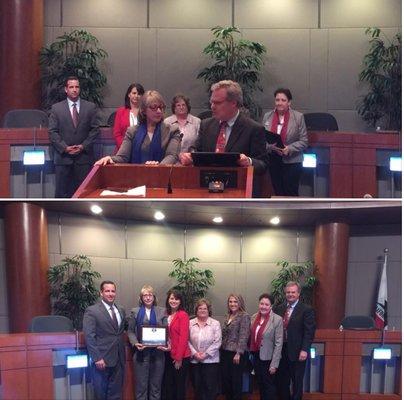 Pam Rumer, President/CEO, San Marcos Chamber of Commerce, receives award at City Council meeting from Mayor Jim Desmond.