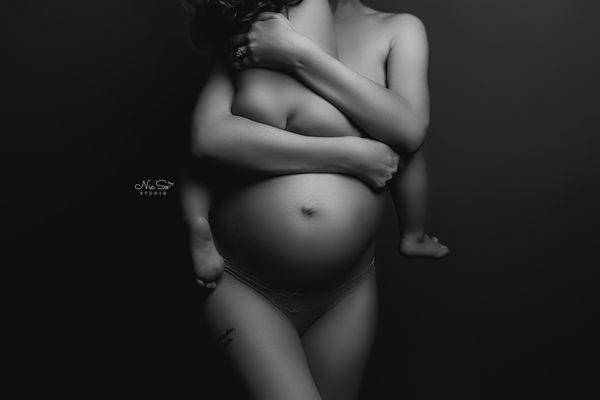 A mother and daughter maternity portrait