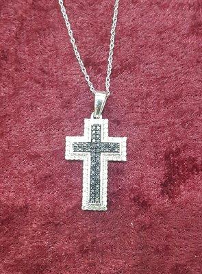 White Gold 10k 
 Black and White diamonds Cross