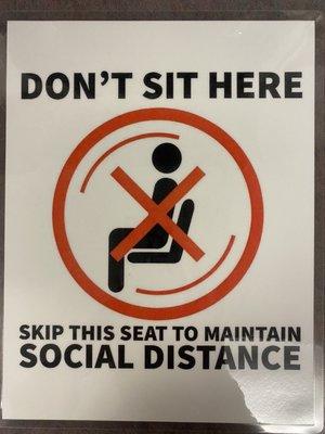 Social distance signage.