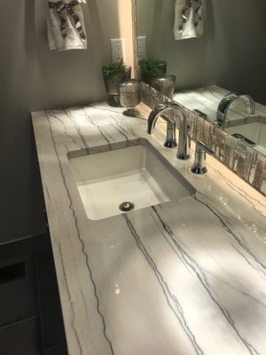 Granite Accents installed this Macabus White quartzite vanity top.