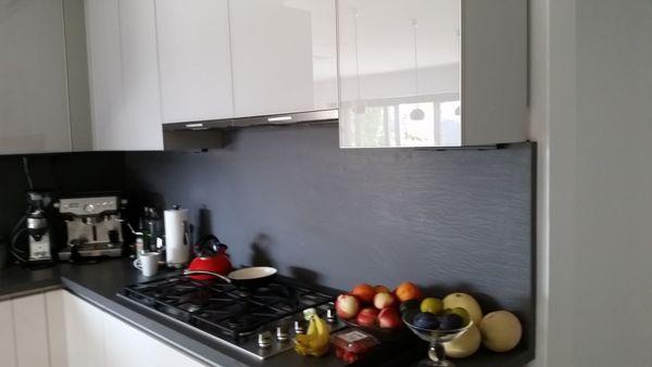 Pacific Palisades luxury kitchen with full quartz counters and backsplash