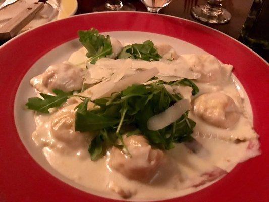 Delicious 4 cheese ravioli with arugula