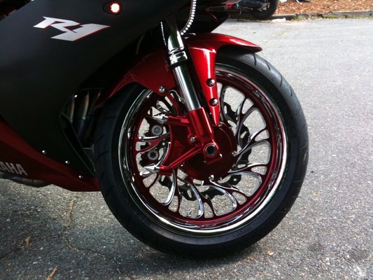 Candy red chrome rim centers. Took use over 40hrs of tape work time to achieve this detailed look only found @ adrenaline