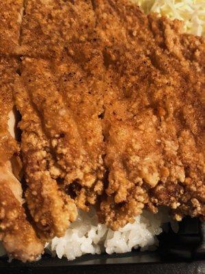 Fried chicken cutlet closeup.