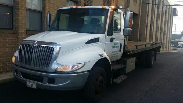 One of our Flatbed Tow trucks