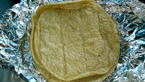 A pile of 6 warm tortillas for the Alambre.