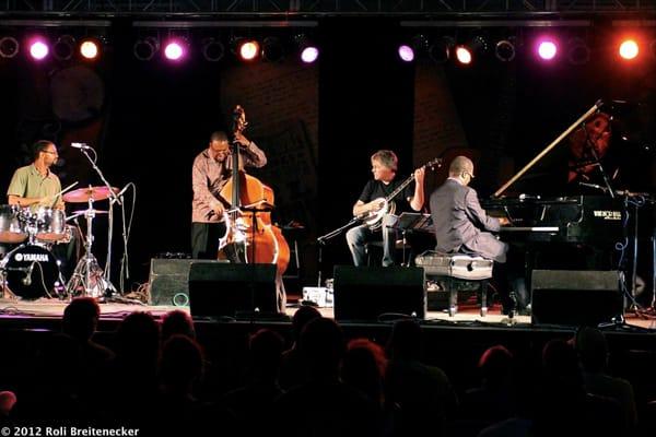 Windsor Hall was pleased to loan our grand piano to DelFest this year.