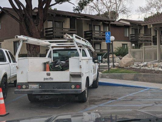 RGS parked in the handicap. I guess they hire handicap people but don't provide the handicap placard.