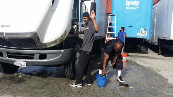 Taking pride in keeping the trucks clean.