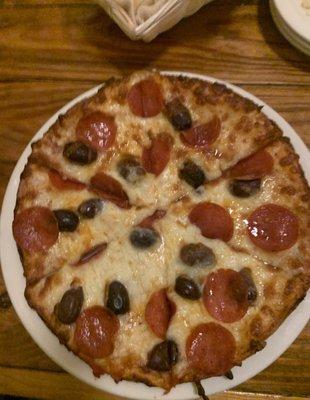 Pepperoni and  Kalamata olive pizza