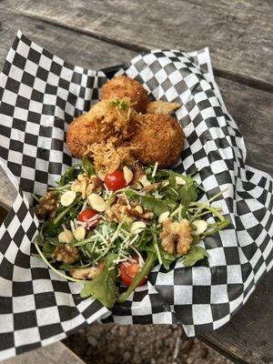 Crab cakes and arugula salad