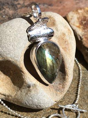 Labradorite & sterling Silver pendant. Texture on the metal, Hand hammered, and reticulated.