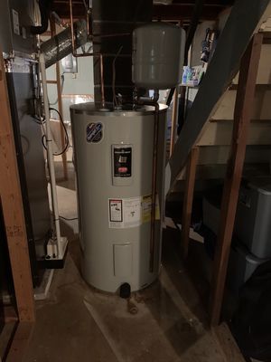 New 50gl water heater with the proper thermal expansion tank.