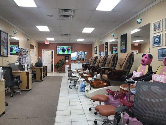 Nice & clean nail salon with 2 cute kiddie chairs.