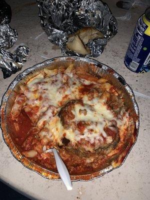 Eggplant Parm dinner with Penne pasta & buttered garlic rolls.