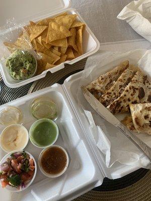 Steak quesadilla, guac and chips.