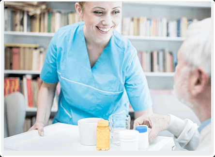 Nurse providing medication.