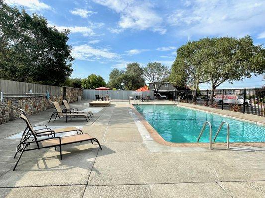 Refreshing community pool with solar heating