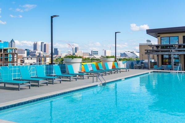 Our amazing Rooftop Pool that showcases stunning views of the Atlanta skyline and original mural artwork.