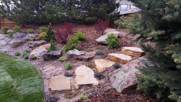 Siloam stairs with boulders and perennials