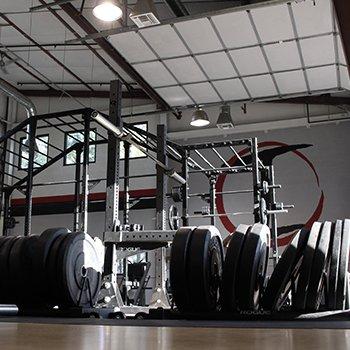 7 stations for deadlifts, squats, and bench