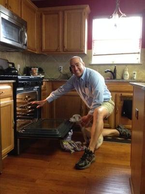 Jojo wanting a treat in the oven:)