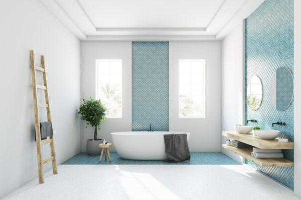 Beautiful bathroom with blue tile accent walls.