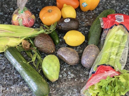 Corn Zucchini  Cucumber  Tomato  Lemon Potato  Bell Peppers  Avocados  ALL OF THIS FOR $13 bucks