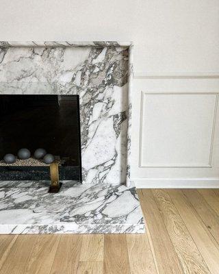 Special ordered marble wrap on an existing fireplace.