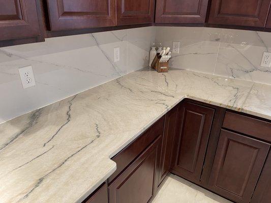 Full kitchen marble installation, backsplash, and floor tile installation result