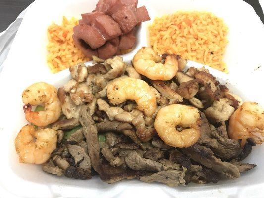 Parrilladas Supreme (Beef Fajita, Chicken Fajita, Shrimp, Sausage, Rice, Beans, Salad, Pico, Guac, and Corn Tortillas)