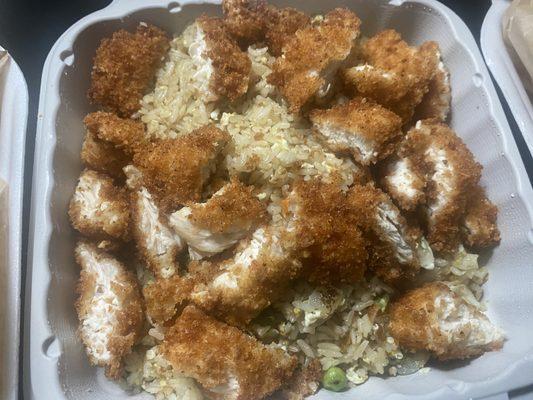 Chicken and rice. Chicken is tender and crispy, but bland dish overall.