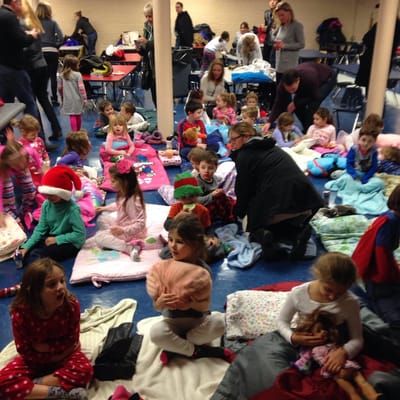 Picture from Polar Express Christmas Party. Kids came in Pjs and families did a pot luck for a great Holiday Tradition.