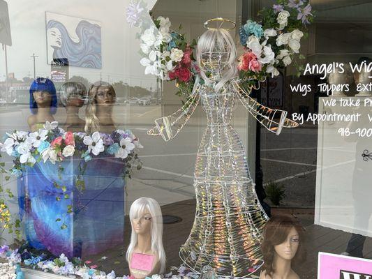 Front Window of business, you will know you found Angels Wigs and More when you see the Angel.