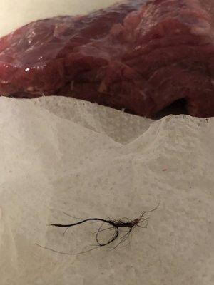 Hair twiddled on meat