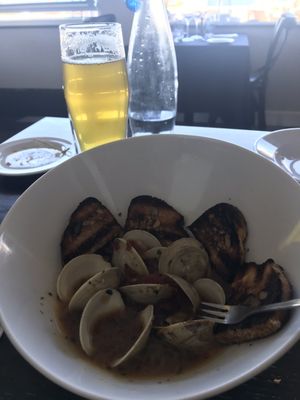 Black clams with fresh bacon and grilled toast