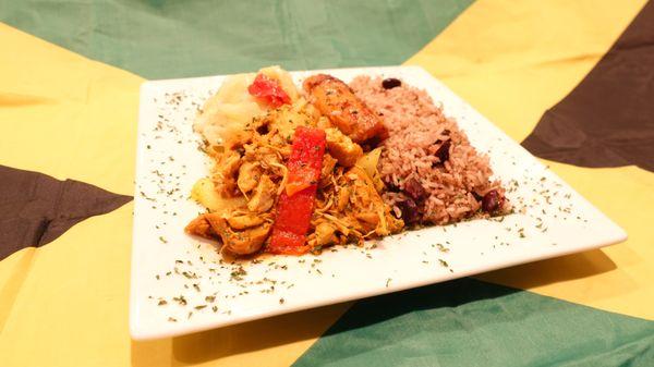 Caribbean Curry Seasoned Chicken Breasts, includes Rice, Plantains, and Vegetables.