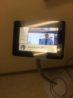 Small touch screen computers next to each table so you can read up on skin health topics