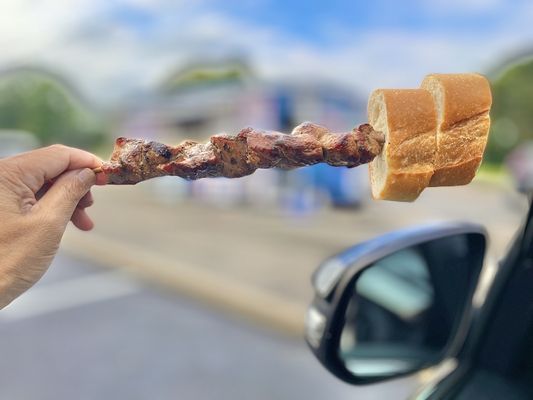 Eating my souvlaki near the food truck