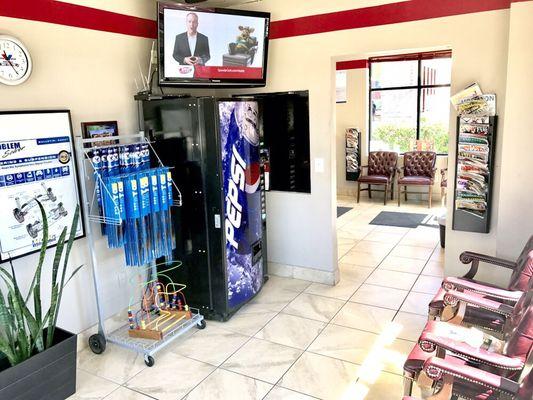 Waiting area with cable tv, free WiFi access and soda vending machine. Free coffee available while you wait