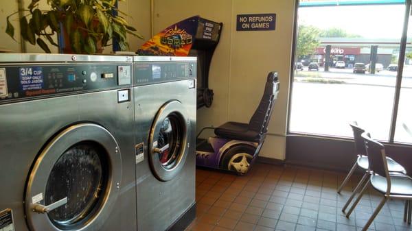 Large capacity 5 load washers, video game, Quick Trip & atm outside.