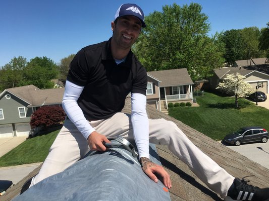 Tarping a leak in Raymore, MO