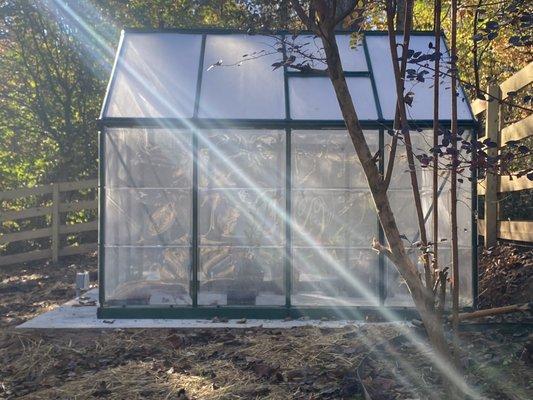 Poured the slab and built the greenhouse.