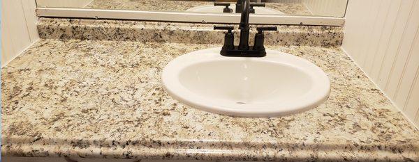 New countertop and sink to freshen up homeowner's bathroom.