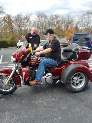 My husband on his new bike..and seth .a real nice man.no pressures at anytime from anyone..they really worked with us..very enjoyable visit