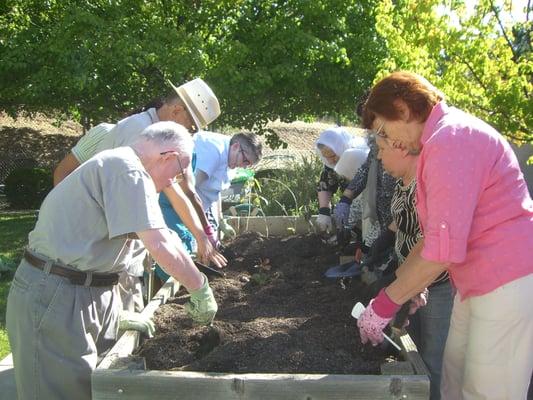 Horticultural Therapy in action on our beautiful back patio.  Just one of the many therapeutic activities participants enjoy.