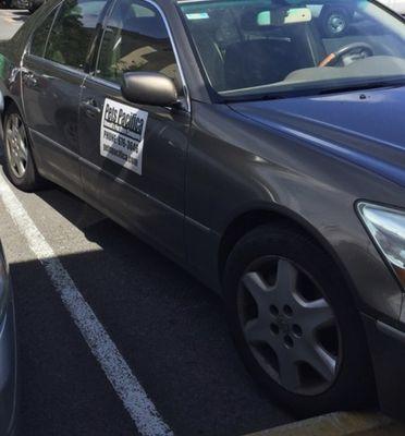 Driver of this vehicle was at Territorial Savings Bank while a black lab was left inside the vehicle with all the windows rolled up.